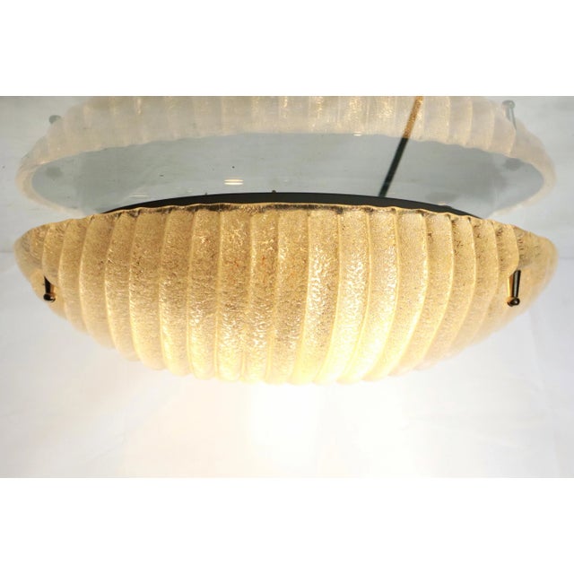 This Van Oorpong German lamp is designed with an ice block in mind, and take a good look, the designer has also succeeded!...