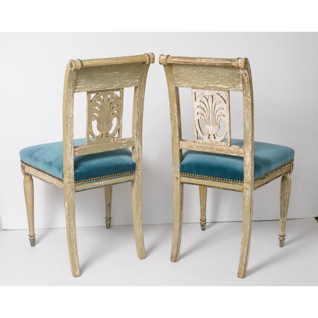 Just in! A rare and exceptionally charming pair of period French Directoire side chairs, dating from the late 18th century...