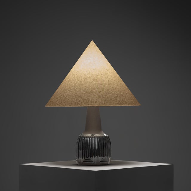 An elegant Model 1039 ceramic table lamp produced by Søholm Stentøj in Denmark during the 1960s. Characterised by its...