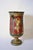 Neoclassical polychrome baluster vase, 1970s. Antique-style terracotta vase on a baluster base, decorated with relief...