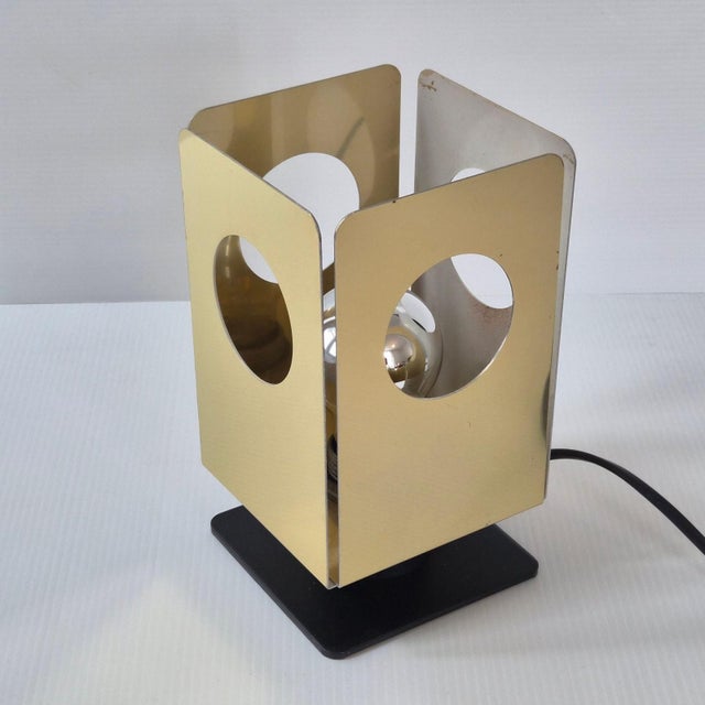 In good condition. Entirely metal. Signs of wear, particularly on one exterior and one interior face. See photos. Works,...