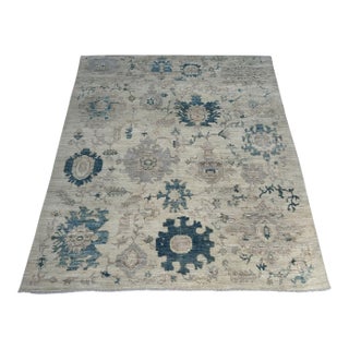 Oushak Handmade Wool Rug With Oversized Blue Florals For Sale