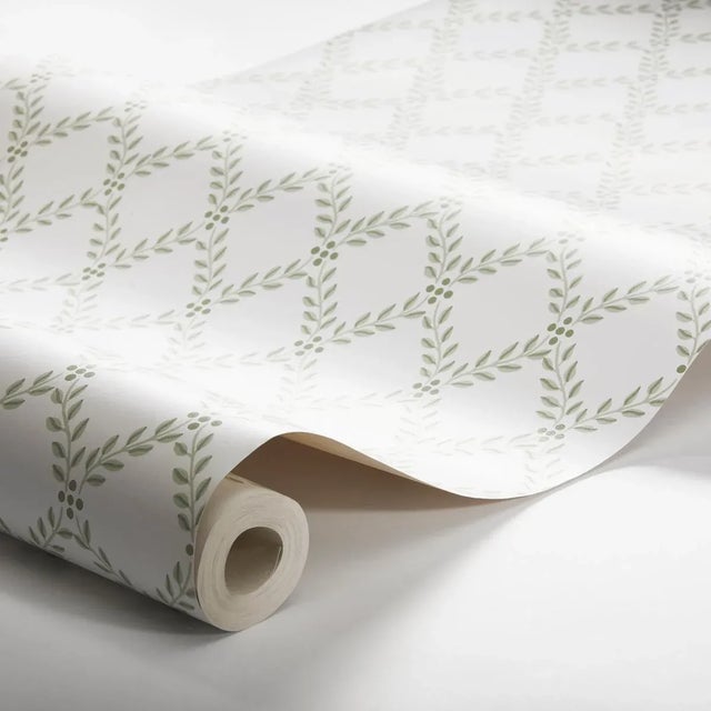 The wallpaper by BorÃ¥stapeter is a classic trellis print of elegantly arranged foliage. Trellis Leaves in leaf makes a...