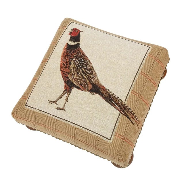 Tapestry Footstools with bun-feet and traditional-style studding.