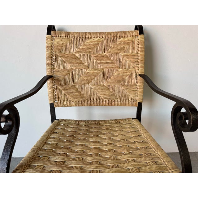 A striking blend of rustic craftsmanship and sculptural elegance, this Organic Modern armchair features a hand-wrought...