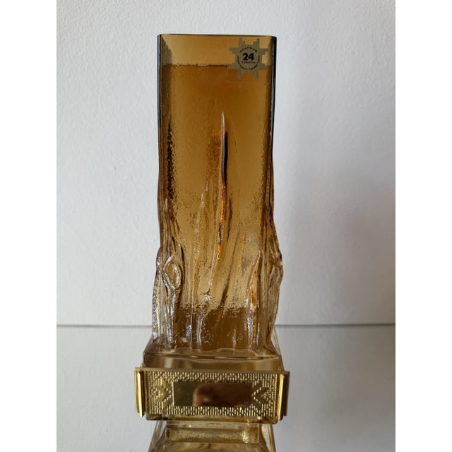 An original "Liekki" (Flame) art glass vase designed by Eino Wänni for the Finnish glassworks Kumela during the 1970s....