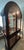 Philip Reinisch Cherry-finished Curio with Beveled Glass Doors. This is a lighted cabinet with glass shelves, 4 doors and...
