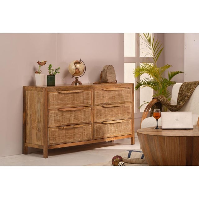 The Eldridge Six Drawers Wood Dresser brings practical storage and natural wood warmth to your sleeping quarters. A...