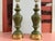 Huge pair of 1960s Neoclassical style cased glass column lamps in saturated mossy green accented by gold rings and crown-...
