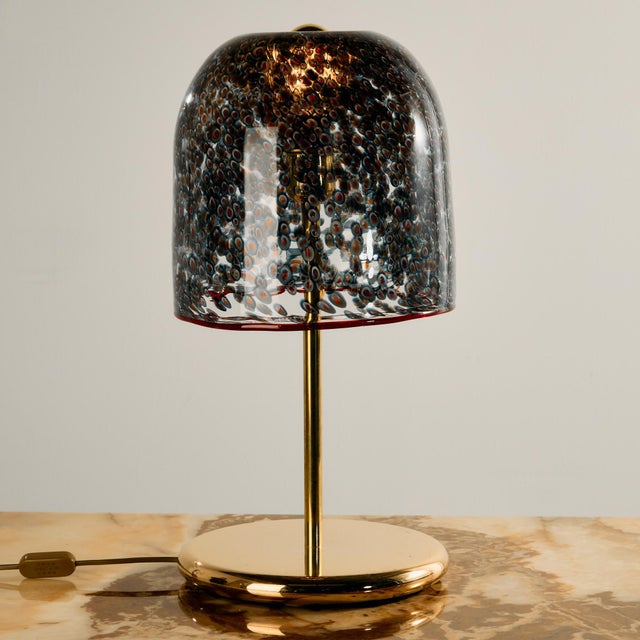 ‘Neverrino’ table lamp from the 1970s, designed by Gae Aulenti for Vistosi. The Murano glass shade is decorated with...