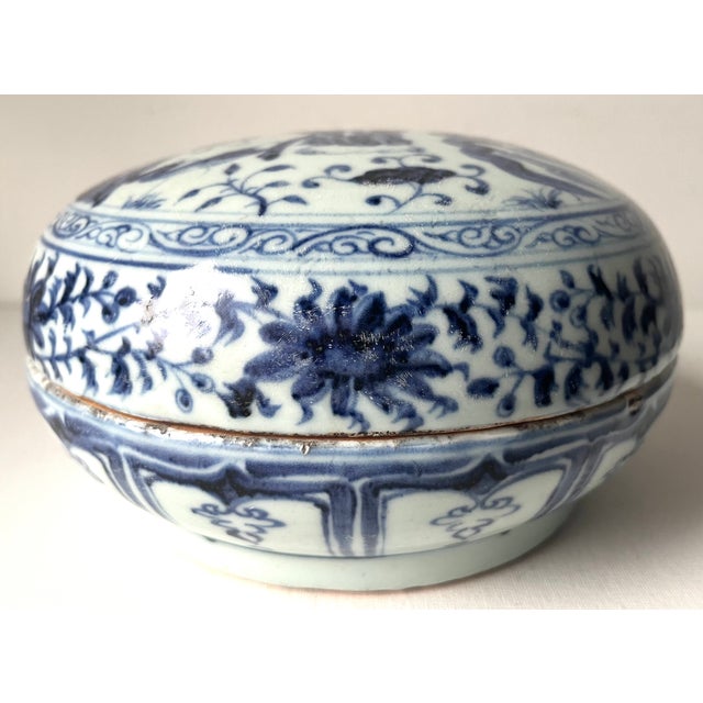 This gorgeous rare large Chinese Ming Blue& White pottery box with lid features a wiseman with floral motif designs. A...