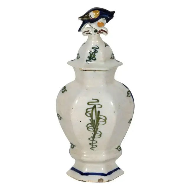 A rare and exceptional five-piece mid-18th century Delft garniture set, hand-painted in rich cobalt and polychrome tones....