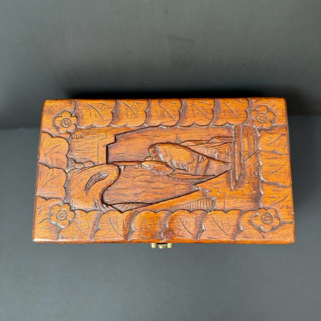 Intricately carved Camphor wood box is perfect for holding jewelry, letters or trinkets. The box has a wonderful patina,...