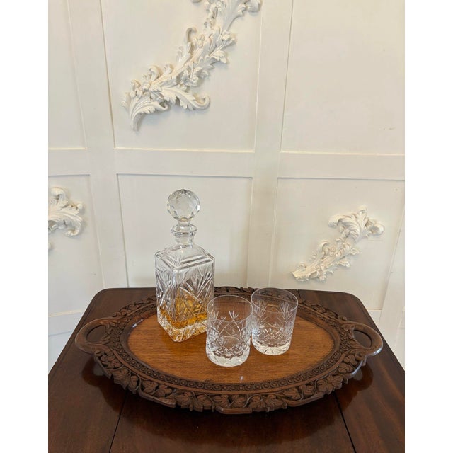 Antique Edwardian quality carved oval tea tray having a quality oval shaped carved teak wood tea tray with carved leaves...