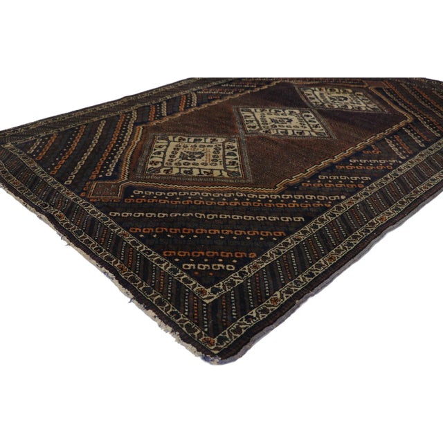 Antique Persian Afshar Rug with Nomadic Tribal Style 04'01 x 05'10. Warm and inviting with a dark and moody color palette,...