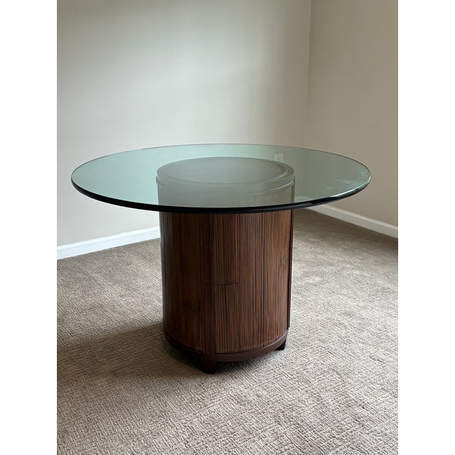 Elegant organic modern table by McGuire San Francisco featuring a sculptural cylindrical bamboo-style pedestal base with a...
