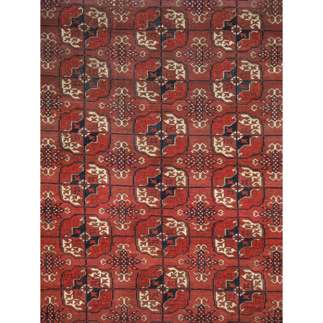 An antique Central Asian Tekke rug. From the most important Turkmen weaving tribe in Turkmenistan, this blood red nomadic...