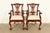 An outstanding pair of Chippendale or Georgian style armchairs or dining captain chairs In the manner of Baker Furniture...