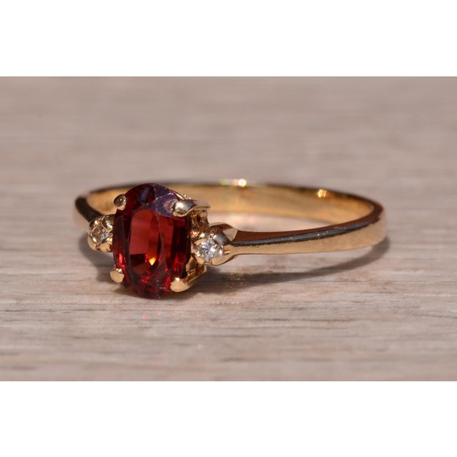 1990s The Caswell: Garnet and Diamond Three Stone Ring In Yellow Gold For Sale - Image 5 of 11