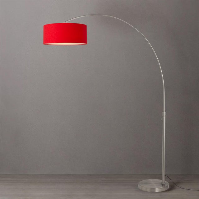 Built with satin nickel steel and a satin nickel steel base, the Float Arc Lamp is a modern arc lamp designed by Peter...