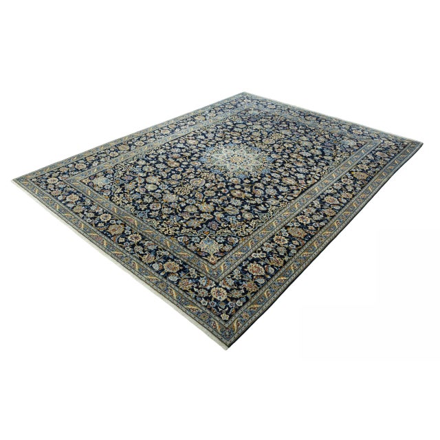 A magnificent, hand-knotted Kashan oriental rug in a generous format (365 x 275 cm), made from high-quality virgin wool...