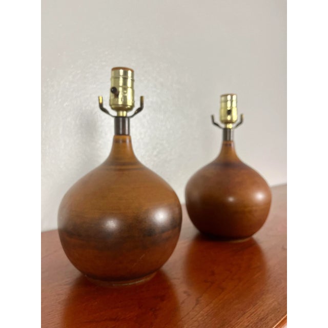A pair of medium brown ceramic bulb table lamps by Lotte and Gunnar Bostlund. Such a rare thing to find a pair of these...