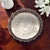 Distinguished by its architectural pierced gallery and substantial weight, this Brazilian alpaca silverplate tray reflects...