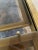1980s Brass and Glass Dining Table With Integrated Extension Leaf For Sale - Image 9 of 12