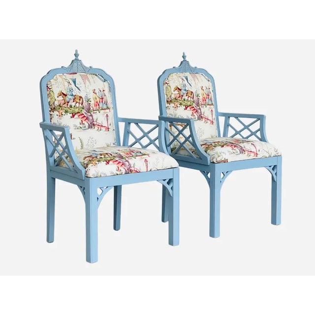 Lovely painted Chinese Chippendale chairs upholstered in Schumacher Greeff Tientsin toile Chinoiserie fabric. Both chairs...