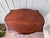 Beautiful vintage pair of lyre-base side tables with carved floral details and gracefully shaped tops. The solid wood tops...