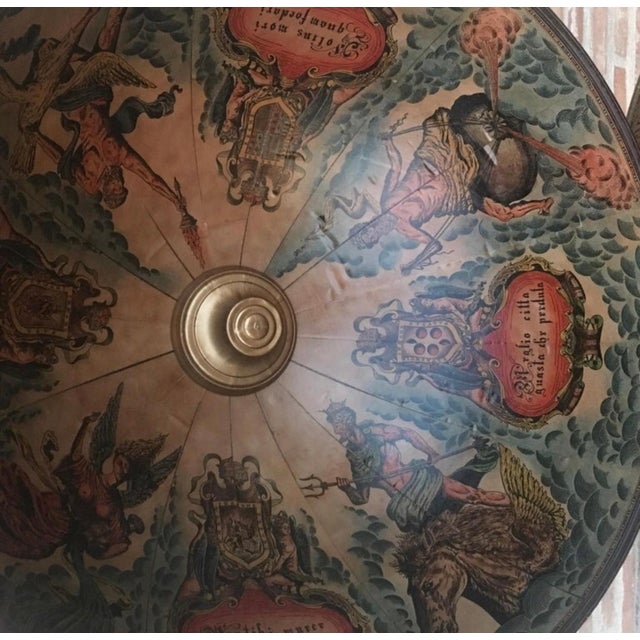 This is a modernist midcentury cocktail drinks cabinet in the form of a globe, circa 1940 in date. The hinged top section...