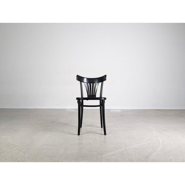 Beautiful vintage café chair from the 1980s by the Polish manufacturer ZPM Radomsko. The chair features a beautiful and...