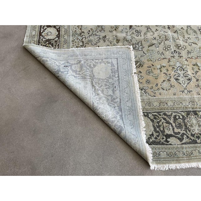 This Antique Distressed Mahal is an all wool Handmade and Hand knotted rug. It has an all over design from the 20th...