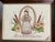 This piece is a framed cross-stitch embroidery sampler, dated 1986. The artwork features a charming, folk-art-inspired...
