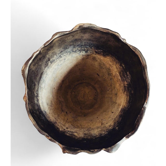 Decorative vase in silver-plated ceramic designed by vera lucino, italy, mid-20th century. the vase features a sculptural...