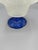 Beautiful vintage frosted glass pedestal bowl featuring an ornate flared rim with raised feather-like detailing and a...