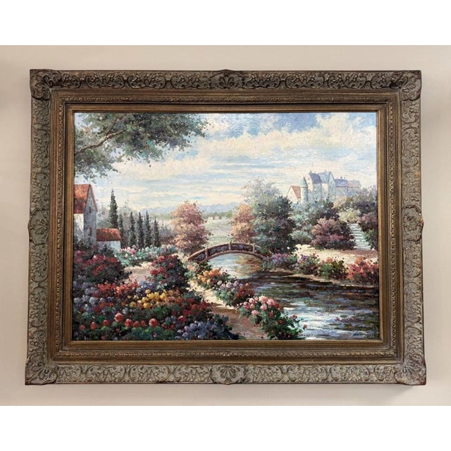 This monumental original oil on canvas captures a romantic countryside garden scene with a charming bridge, blooming...