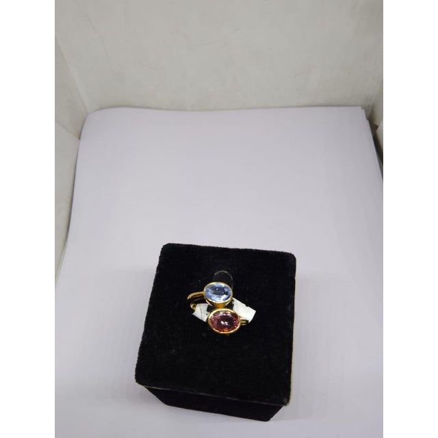 Gemstone details Gold Purity: 18K Solid Gold Blue sapphire: 5.20 cts Morganite: 2.80 cts 18K gold Net weight: 3.25 grams...