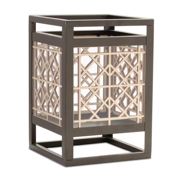 Enhance your home decor with the Cut-Out Wood Candle Holder, designed to offer a perfect blend of rustic charm and modern...