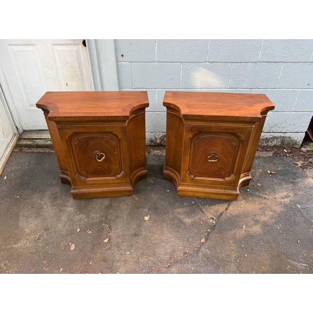 Pair of Neoclassical style Davina Collection nightstands/ side cabinets by Drexel It features Inlaid top, hexagonal/curved...