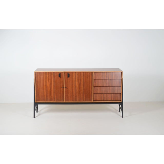 Mid-century sideboard designed by Alfred Hendrickx in 1958. This beautiful piece of furniture was manufactured by the...