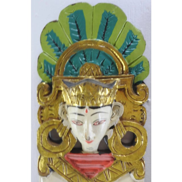 This is a stunning pair of hand-painted Indonesian carvings. The matching sculptures, carved in shallow relief, depict...