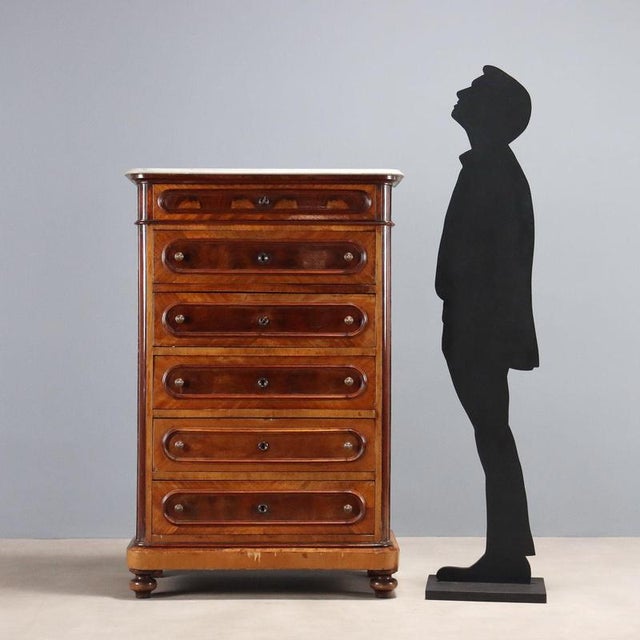 Mahogany chest of drawers. Six drawers front, the first, lowest, is in the band beneath the top. Cherry and poplar...