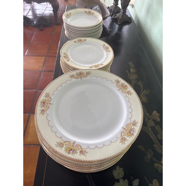 Elevate your table with this elegant, classic, hand-painted vintage China set made in Japan and admired for its delicate...