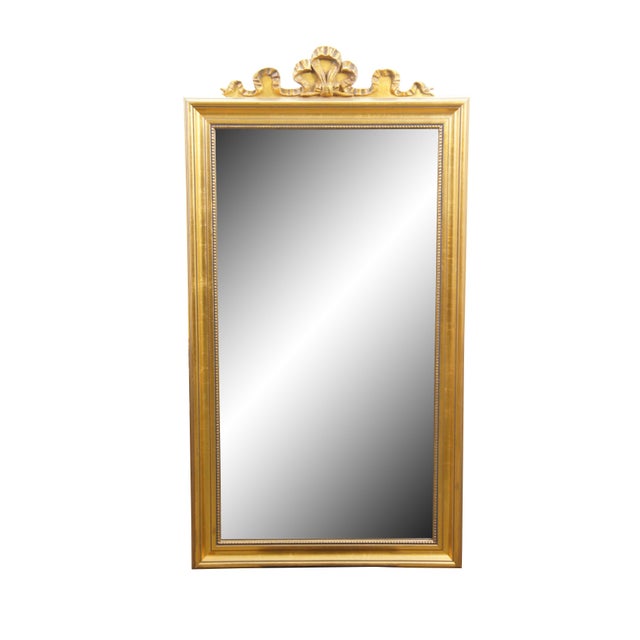 This vintage wall mirror, manufactured in 1989 by Windsor Art of California, beautifully captures the luxurious aesthetic...