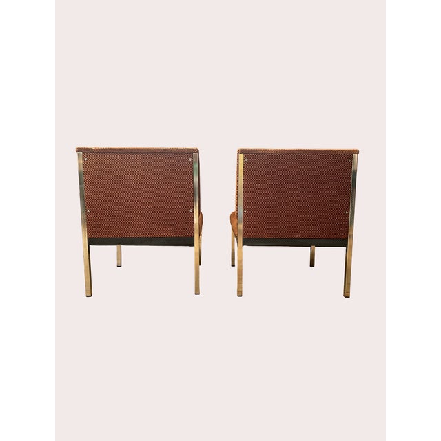 Pair of armchairs from the 1960s-70s. Upholstered in original textured tricolor jacquard velvet in terracotta, black and...