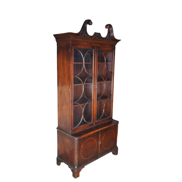 An exceptional banded mahogany China Display Cabinet or Bookcase by Union National, circa 1940s. Designed in George III...