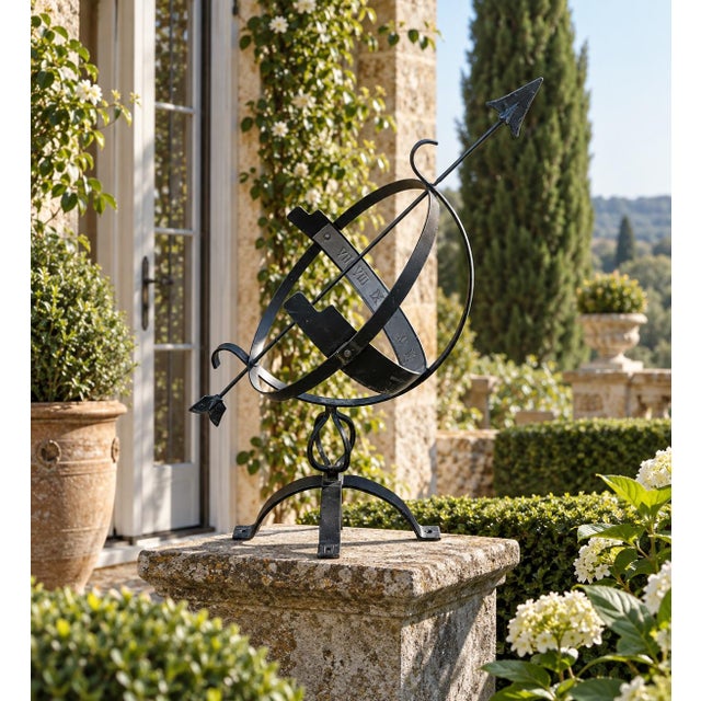 A beautifully crafted iron armillary half-sphere, evoking the timeless elegance of classical European gardens. Pieces like...