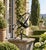 A beautifully crafted iron armillary half-sphere, evoking the timeless elegance of classical European gardens. Pieces like...