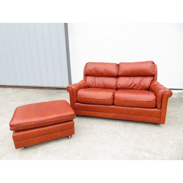 Vintage 'Genuine Leather' sofa loveseat in outstanding vintage condition! This couch is so comfy, it is pretty hard to...